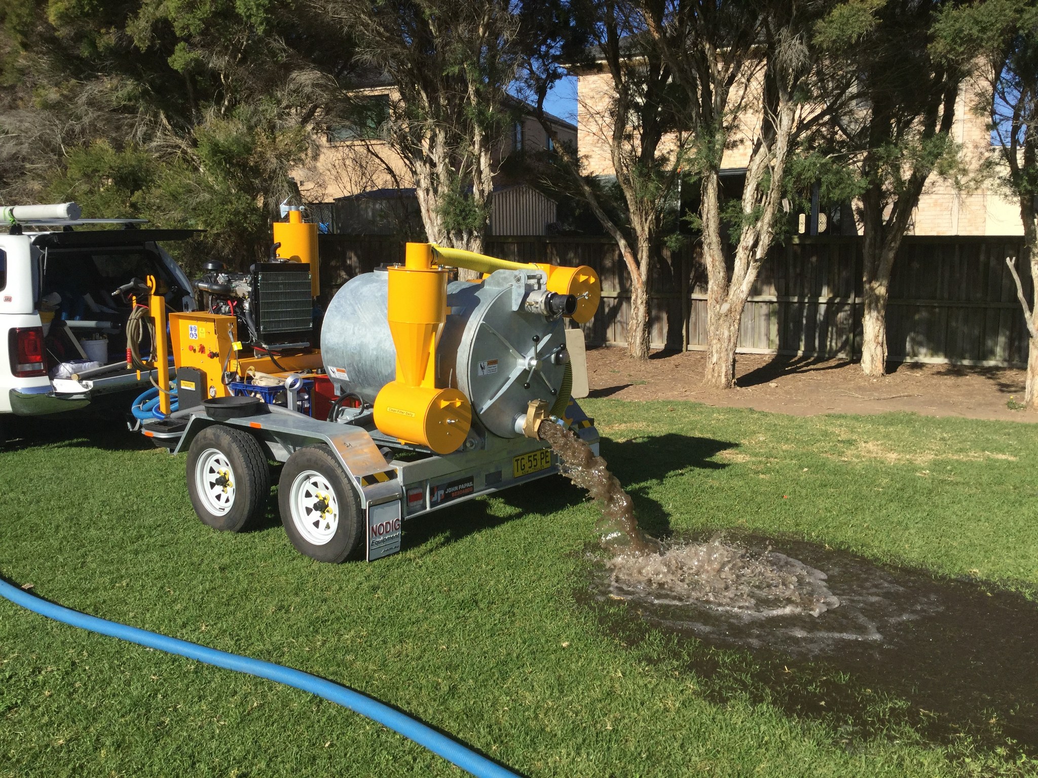 cleaning sludge in the bottom of a water tank